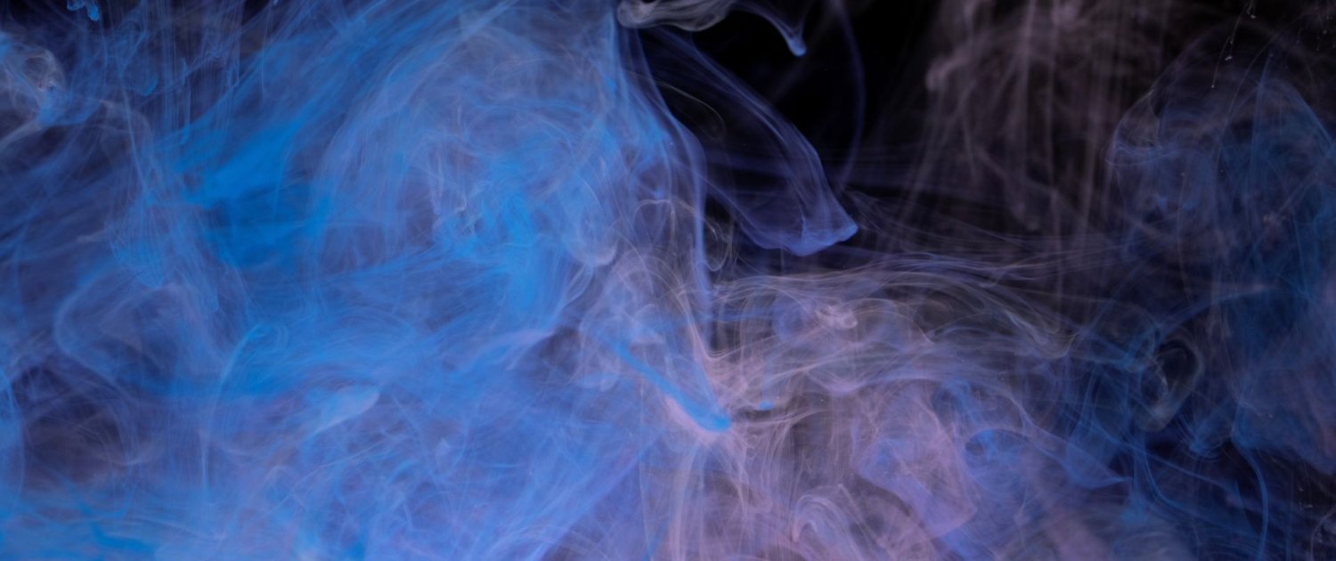 blue smoke mixing with air
