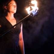 woman with flaming torch representing warrior woman in victim or warrior