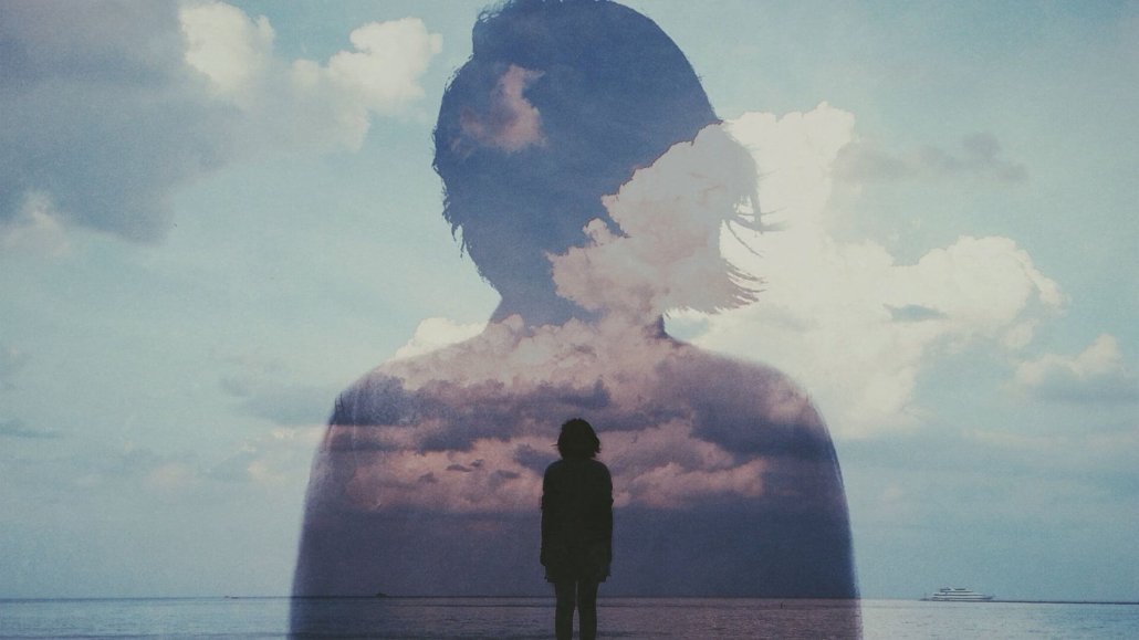 Stop calling it love Woman's silhouette dissolving into clouds - visual metaphor for losing yourself in relationships through self-erasure and accommodation