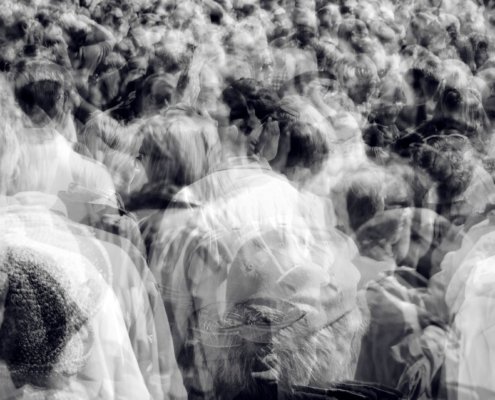 crowd blurred into one representing fluidity