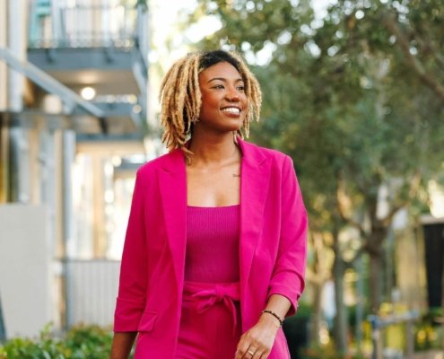 Woman walking confidently - own your story without apologizing